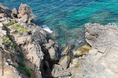 Mallorca rocky coast with sea and waves