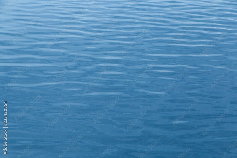 Obraz premium abstract blue background with water ripples