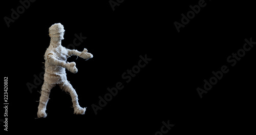 Scary mummy character on black background. Halloween poster template. Copy space © besjunior