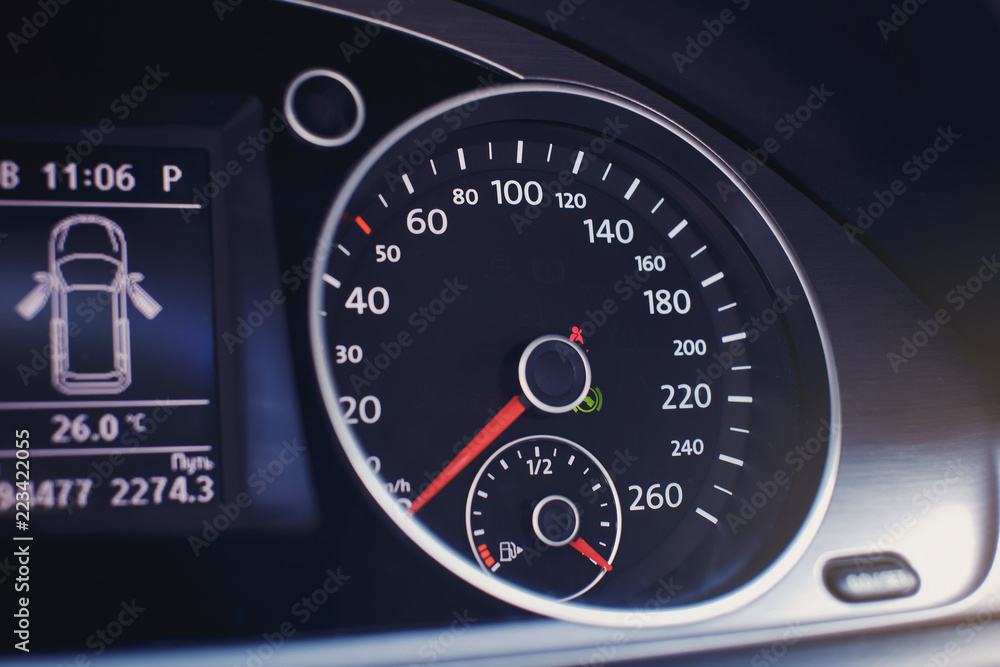 Modern car dashboard. Tachometer, fuel level and icons on the panel screen. Modern car dashboard. Tachometer, fuel level and icons on the panel screen.