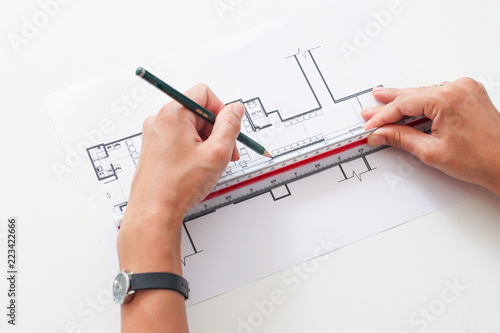 architect and an interior designer Drawing a plan