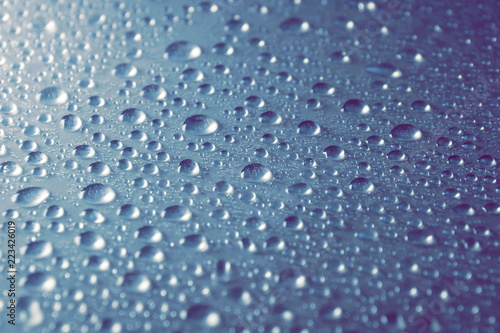 water drops on grey blue steel background texture