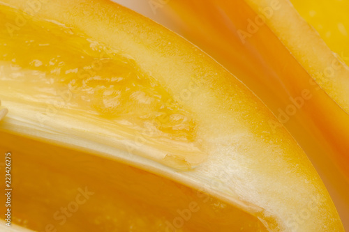 macro photography of seeds of yellow paprika. selective focus, blurred image. cut Bulgarian pepper, Colors of autumn.
