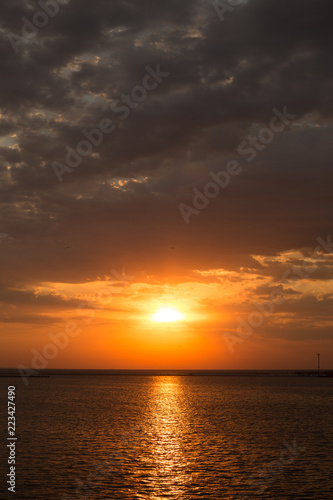 dawn overlooking the sea and the horizon in the summer in the port of Odessa © Вадим Михеев
