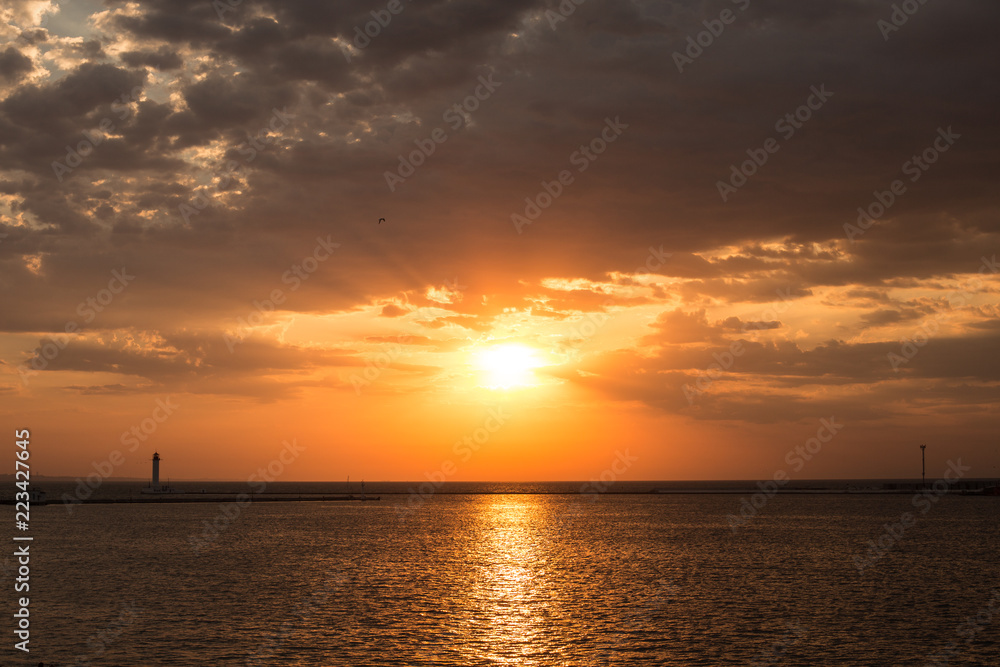 dawn overlooking the sea and the horizon in the summer in the port of Odessa