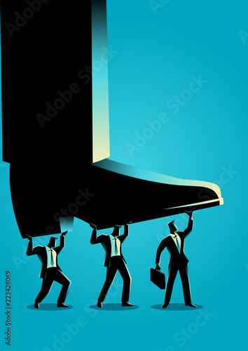 Businessmen trying to lift up giant foot