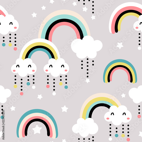 Seamless childish pattern with cute rainbow, stars, clouds.Creative scandinavian kids texture for fabric, wrapping, textile, wallpaper, apparel. Vector illustration