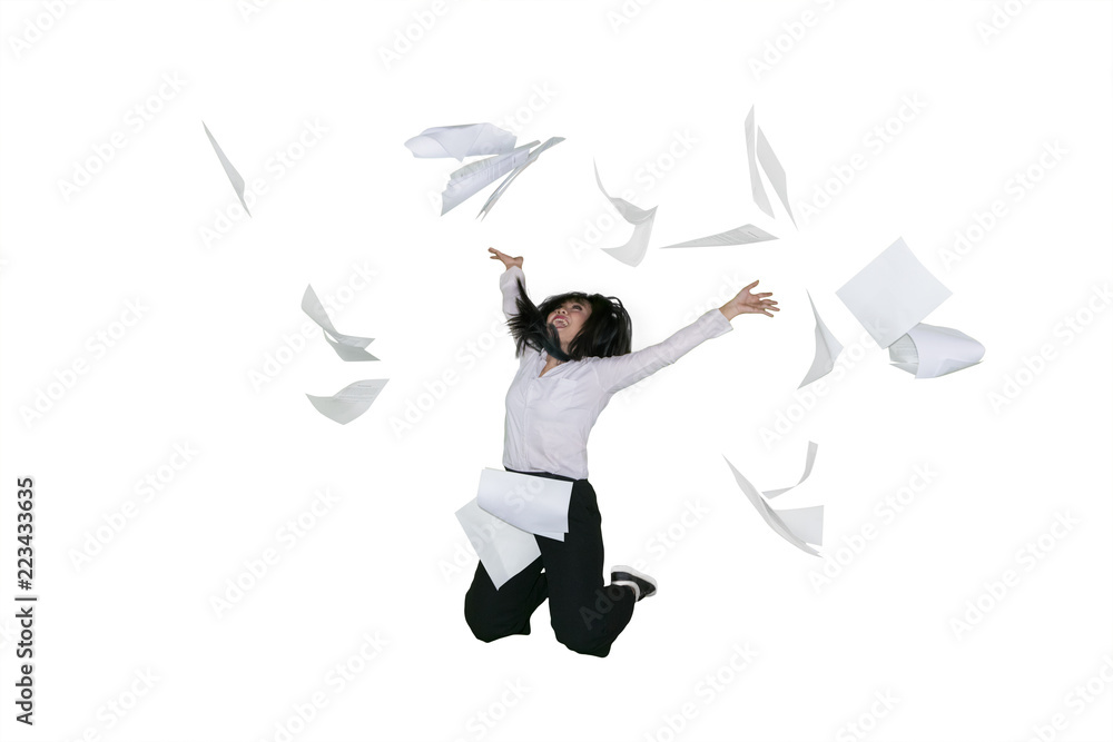 Successful businesswoman jumps with documents Successful businesswoman jumps with documents