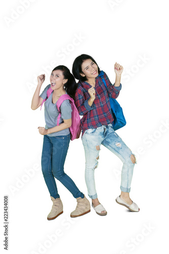 Two college students dancing in the studio