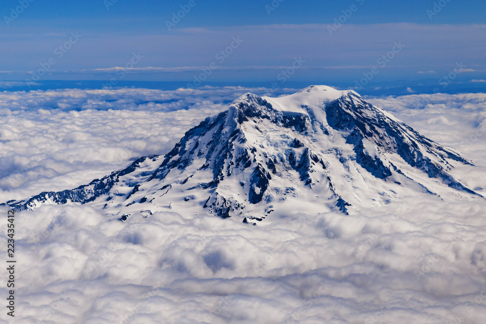 Snow and cloud covered Mount Rainier 
