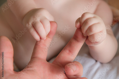 handle babies keep fingers adult parent and shrink