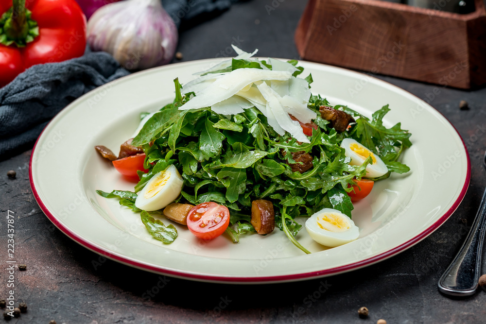 salad with arugula and fried mushrooms salad with arugula and fried mushrooms