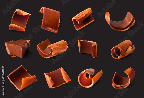 Realistic chocolate pieces and shavings. Vector illustration isolated on white background. Ready for your design. EPS10.