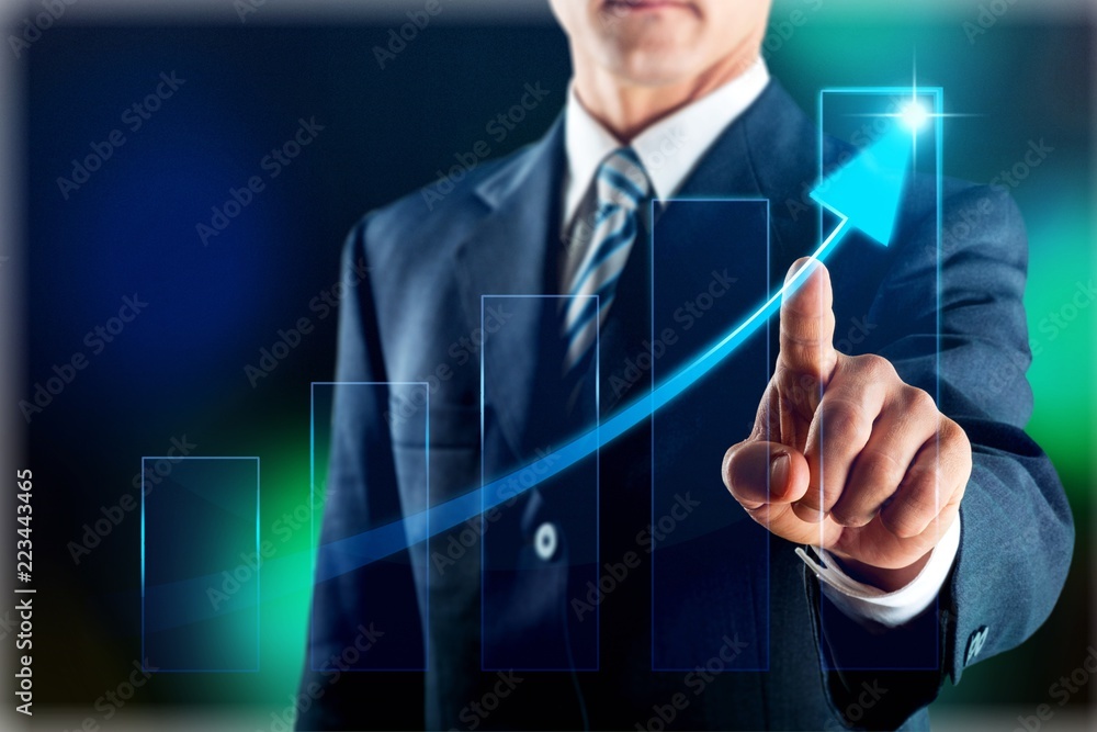 Young business man in suit touch arrow Young business man in suit touch arrow