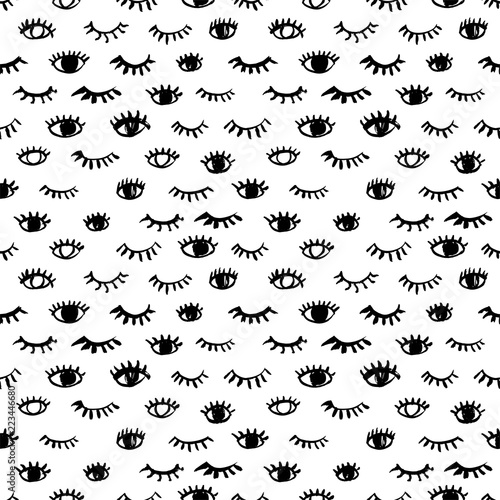 Seamless pattern with eyes and eyelashes. Hand drawn vector ornament. 