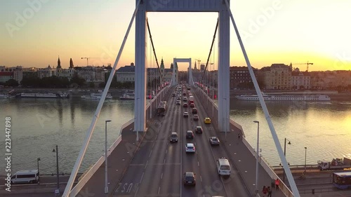 Budapest, Hungary - 4K heavy morning traffic on Elisabeth Bridge at sunrise, flying from Buda to Pest