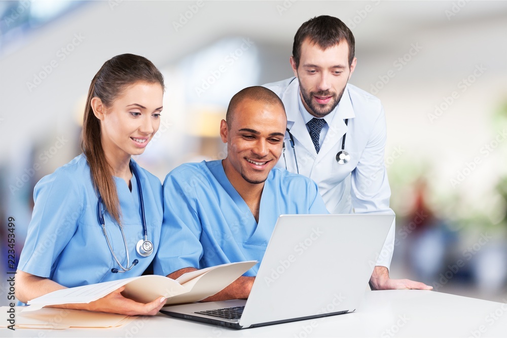 Doctors team talking expertise on background Doctors team talking expertise on background