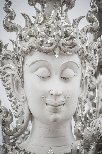 Buddhist figure detail. Wat Rong Khun White Teple, Chiangrai Thailand © guruXOX