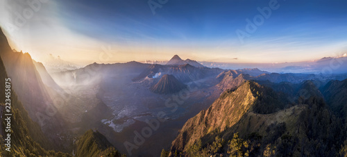 Panorama of Mount Bromo volcano (Gunung Bromo) during sunrise in East Java, Indonesia. With its beautiful harsh climate, attracts many tourists every day.