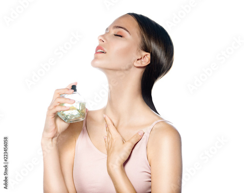 closeup portrait of attractive young caucasian smiling woman brunette isolated on white studio shot lips toothy smile face hair head and shoulders looking at camera 