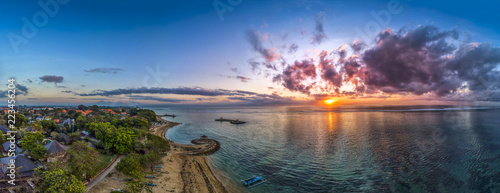 Sanur Beach in sunrise with Traditional Balinese Fishing Boats, Bali, Indonesia.. photo