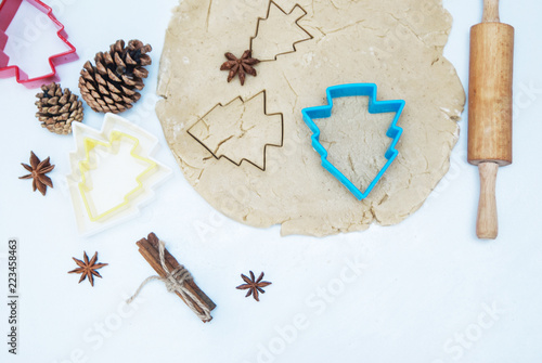 Little girl makes a christmas cookies. 
