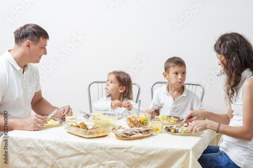 Family Concepts and Ideas of Combined Eating. Happy Parents with Their Children Having Breakfast at Home Together.