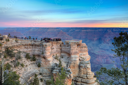 Photography Dawn Arrives at the South Rim, Grand Canyon, Pink Glow in the Sky and Tourists a