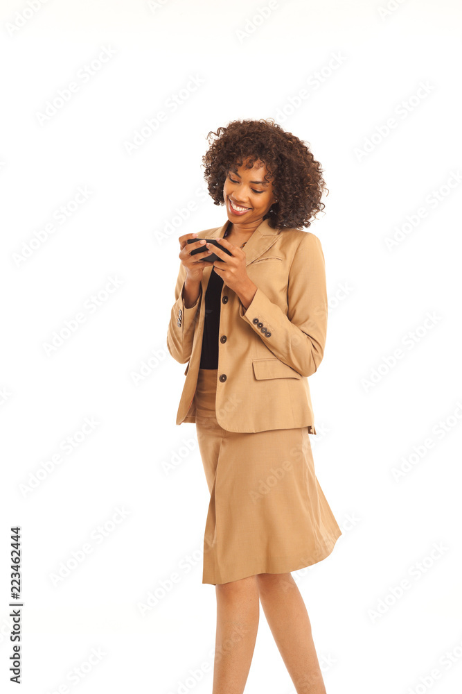 Lovely young businesswoman reading text messages on smartphone
