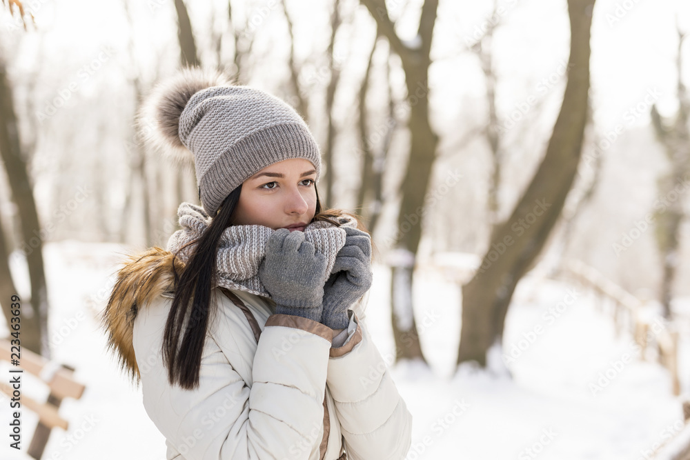 Beautiful woman outdoors in the snow Beautiful woman outdoors in the snow