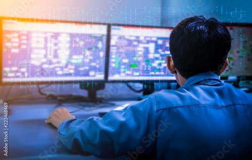 Foto EngineeringLandscape of works with the tablet in the production control room