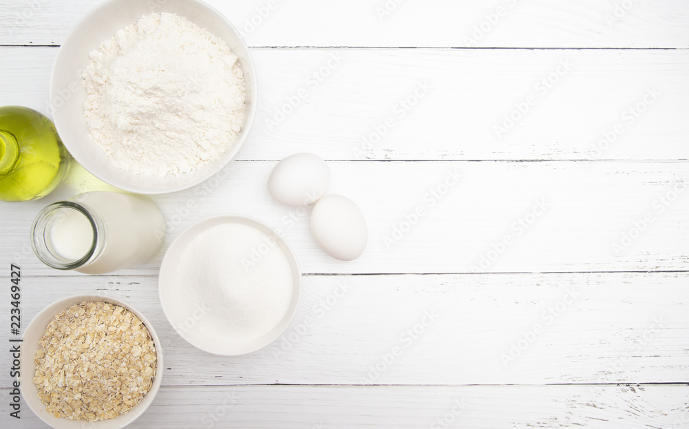 Fototapeta premium Baking Background on a White Wood Table