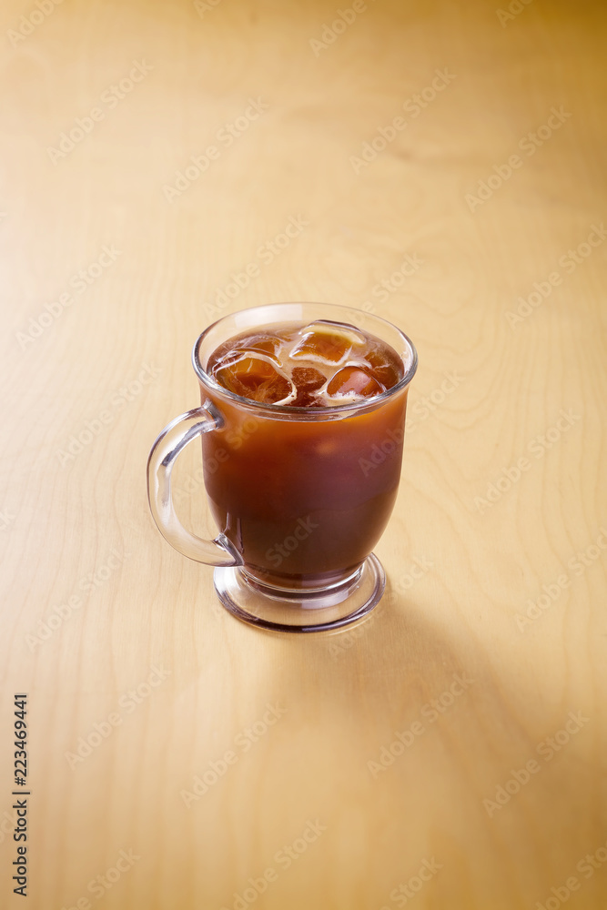 ice coffee on a wooden table ice coffee on a wooden table