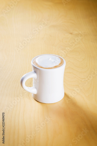 hot latte on the wooden table