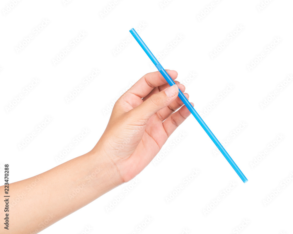 Фотография hand holding drinking straw isolated on white background.