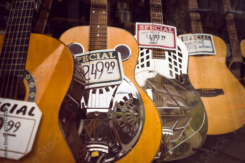 Guitars on display in shop window