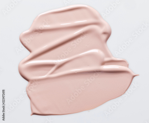 the texture of a foundation liquid, a white background