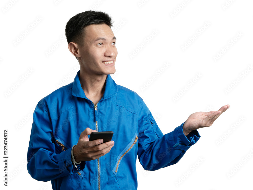 Oil engineer using mobile phone, Asian man portrait. Oil engineer using mobile phone, Asian man portrait.
