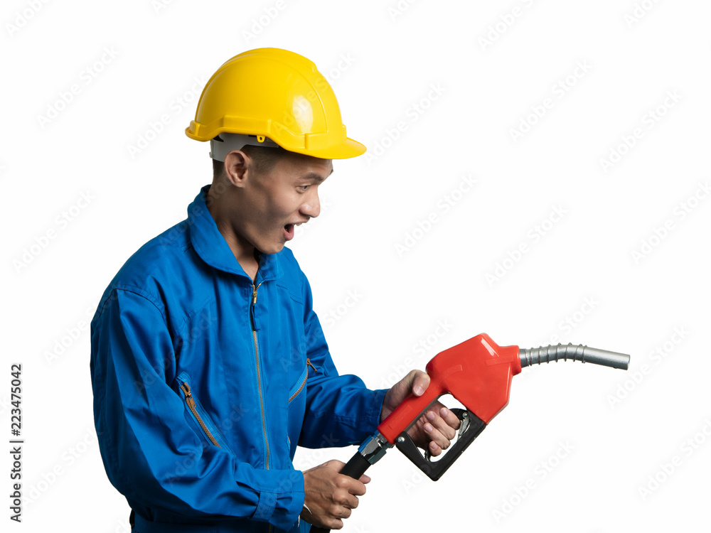 Asian Thai person holding Fuel Oil Nozzle for Oil System Gasohol 91. Asian Thai person holding Fuel Oil Nozzle for Oil System Gasohol 91.