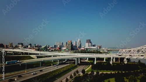 4k aerial view and flyover of bridges outside Louisville with skyline in the distance