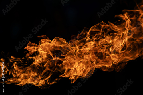 Closeup Fire flames on black background. © jat306