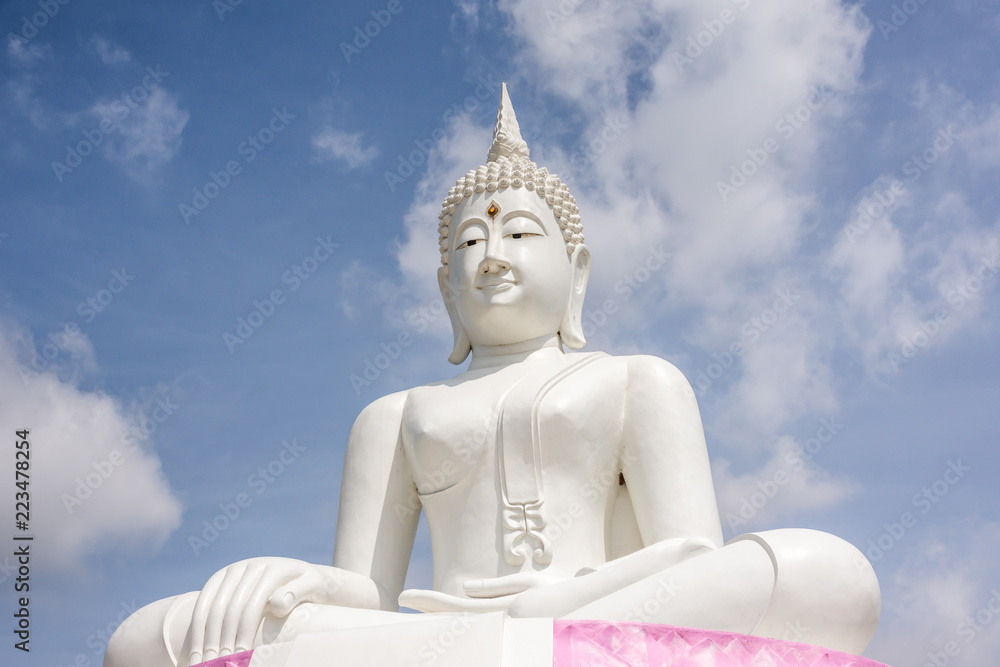White Buddha and sky background Phra Buddha Rattanamanee Mahaborphit Chonlasit Mongkholchai, Located near Pa Sak Jolasid Dam Thailand. White Buddha and sky background Phra Buddha Rattanamanee Mahaborphit Chonlasit Mongkholchai, Located near Pa Sak Jolasid Dam Thailand.