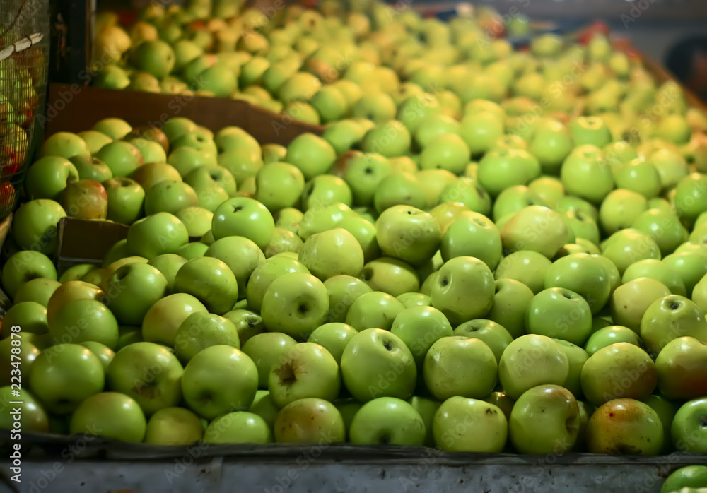 green apples on the market at night green apples on the market at night
