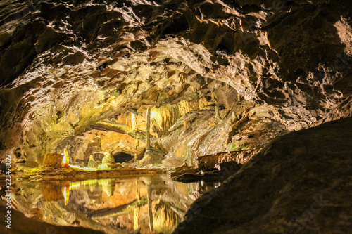 The beautiful cave complex with stalactite and stalagmite and the reflection in the St Beatu Cave, Switzerland