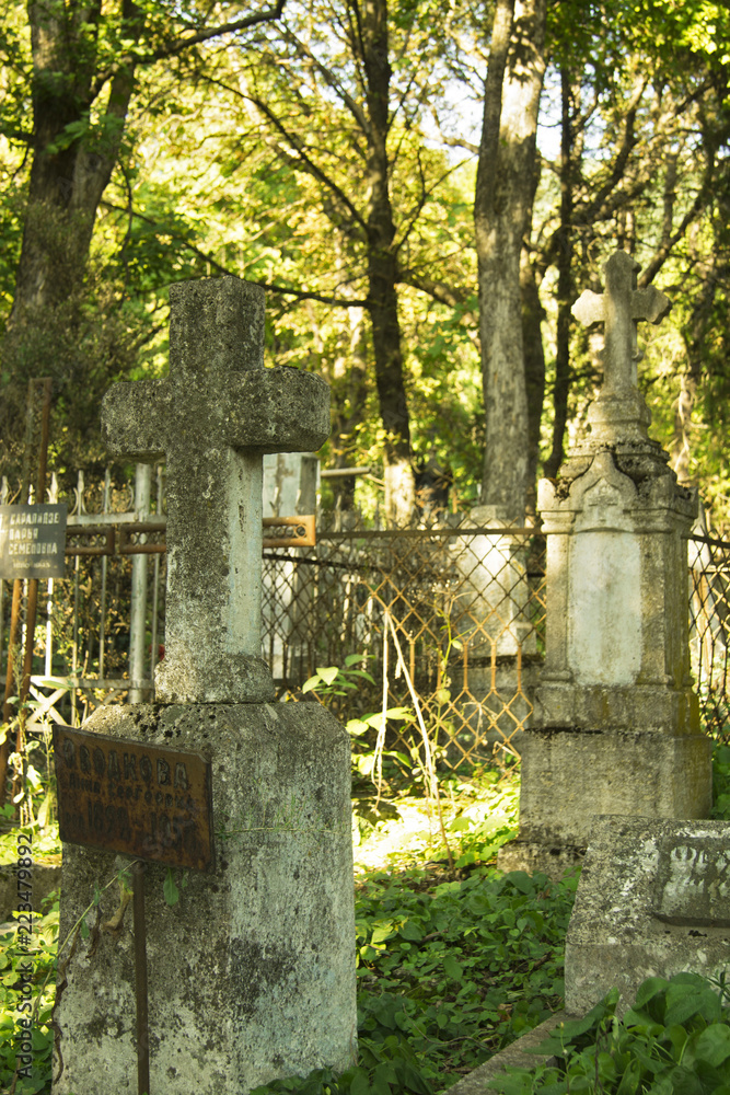 Old stone monuments with crosses on The Old cemetary. Historical part of Pyatigorsk Old stone monuments with crosses on The Old cemetary. Historical part of Pyatigorsk