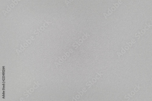 Texture of rough white hard plastic sheet, abstract background