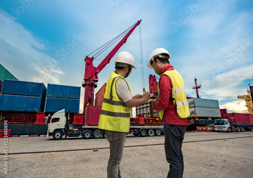 loading master, supervisor, foreman, port controller working in charge in port terminal, checking unit containers report online for loading discharging operation takes control by swift report 