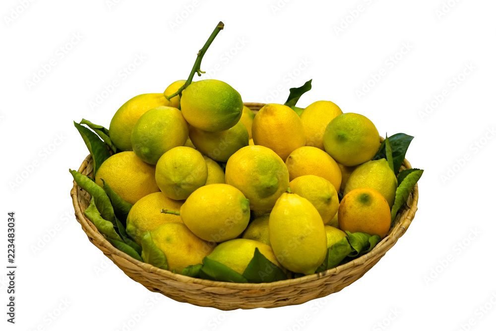 Lemons in basket isolated on white background Lemons in basket isolated on white background