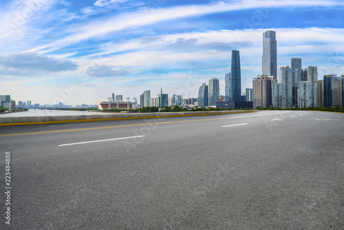 Road pavement and Guangzhou city buildings skyline