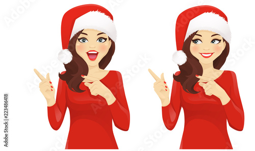 Surprised woman pointing away in santa hat isolated vector illustration